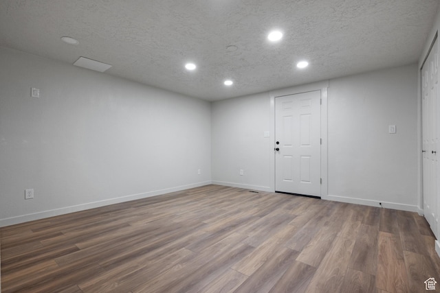 1455 E 100 S, Spanish Fork, UT 84660 - empty room featuring recessed lighting, a textured ceiling, baseboards, and wood finished floors