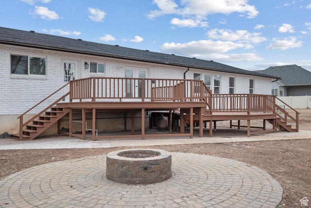 1455 E 100 S, Spanish Fork, UT 84660 - rear view of house featuring stairs, a fire pit, and a wooden deck