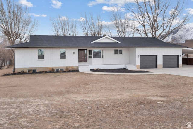 1455 E 100 S, Spanish Fork, UT 84660 - ranch-style home with an attached garage, brick siding, and driveway