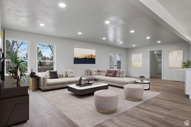 1455 E 100 S, Spanish Fork, UT 84660 - living area featuring recessed lighting, french doors, a textured ceiling, and wood finished floors