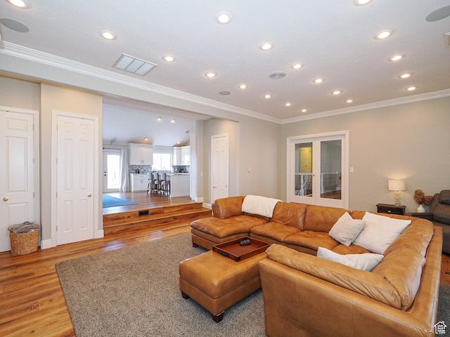 2960 E Oak Park Ln S, Holladay, UT 84117 - living area with crown molding, recessed lighting, visible vents, and light wood-style floors
