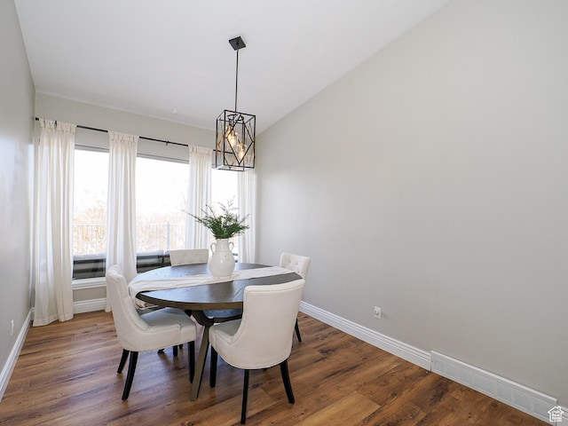 2960 E Oak Park Ln S, Holladay, UT 84117 - dining area featuring visible vents, baseboards, a chandelier, and wood finished floors