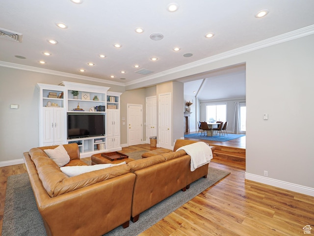 2960 E Oak Park Ln S, Holladay, UT 84117 - living room with light wood-type flooring, baseboards, ornamental molding, and visible vents