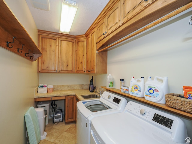 2960 E Oak Park Ln S, Holladay, UT 84117 - clothes washing area with a sink, light tile patterned floors, cabinet space, and separate washer and dryer