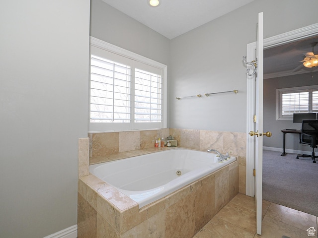 2960 E Oak Park Ln S, Holladay, UT 84117 - bathroom with a ceiling fan, a jetted tub, baseboards, and tile patterned flooring