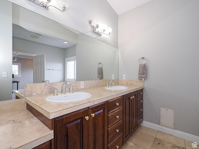 2960 E Oak Park Ln S, Holladay, UT 84117 - full bath featuring double vanity, visible vents, a sink, and a healthy amount of sunlight