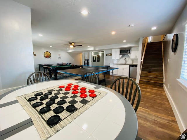 37 Wedge Way, Garden City, UT 84028 - dining area featuring ceiling fan, sink, and wood-type flooring