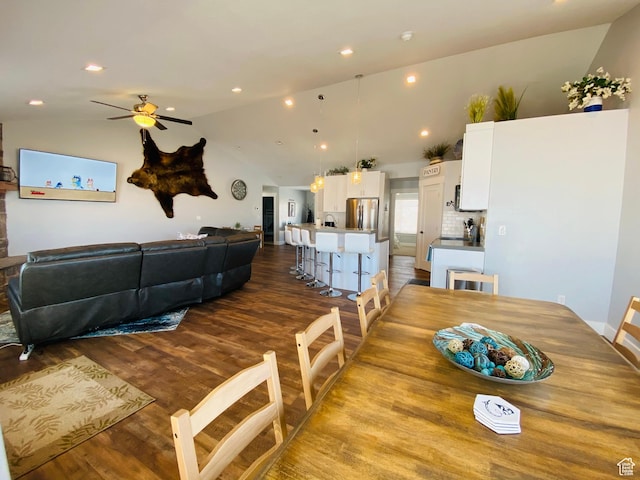 37 Wedge Way, Garden City, UT 84028 - dining area with ceiling fan, vaulted ceiling, and hardwood / wood-style floors