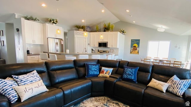 37 Wedge Way, Garden City, UT 84028 - living room with sink and lofted ceiling