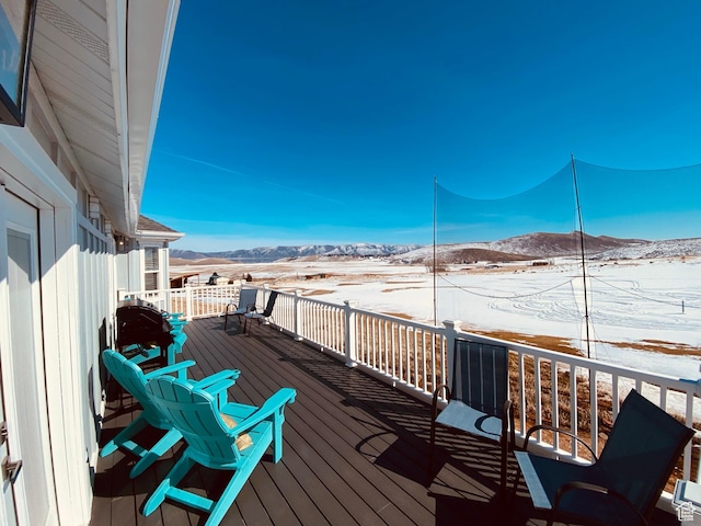 37 Wedge Way, Garden City, UT 84028 - snow covered deck featuring a mountain view