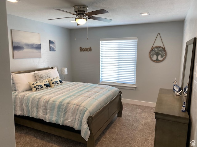 37 Wedge Way, Garden City, UT 84028 - bedroom with ceiling fan and carpet flooring