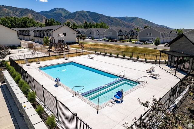 460 W 15 S Unit G301, Providence, UT 84332 - community pool featuring a residential view and a mountain view