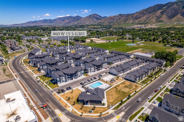 460 W 15 S Unit G301, Providence, UT 84332 - aerial view of residential area with a mountain backdrop and a pool area