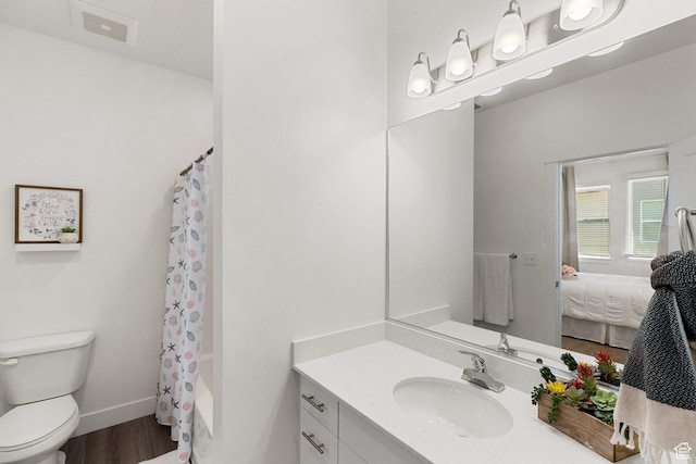 460 W 15 S Unit G301, Providence, UT 84332 - full bath featuring vanity, toilet, shower / bath combination with curtain, ensuite bath, and wood finished floors