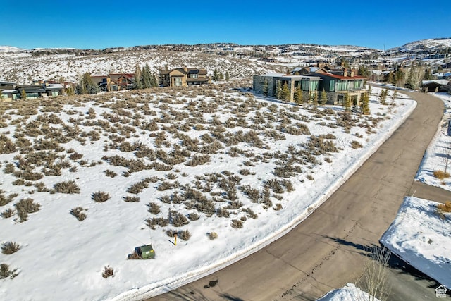2473 E W View Trl, Park City, UT 84098 - snowy aerial view featuring a mountain view