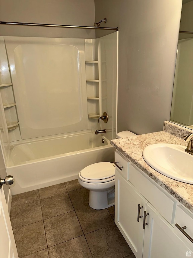 full bathroom featuring toilet, vanity, and shower / tub combination