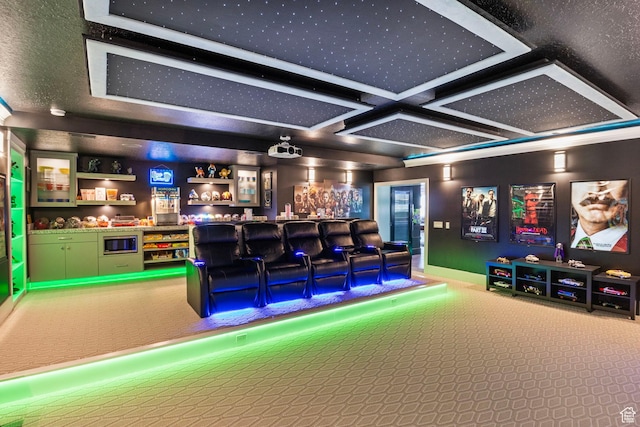 home theater featuring carpet flooring, coffered ceiling, and bar area