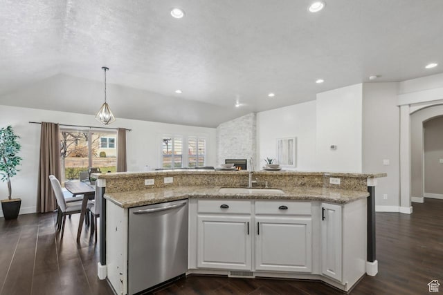 6228 W Apollo Way, Highland, UT 84003 - kitchen with an island with sink, decorative light fixtures, stainless steel dishwasher, white cabinets, and sink