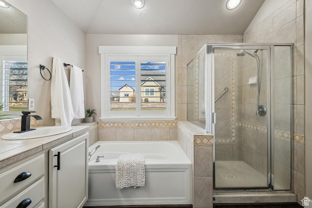 6228 W Apollo Way, Highland, UT 84003 - bathroom with lofted ceiling, vanity, plenty of natural light, and shower with separate bathtub