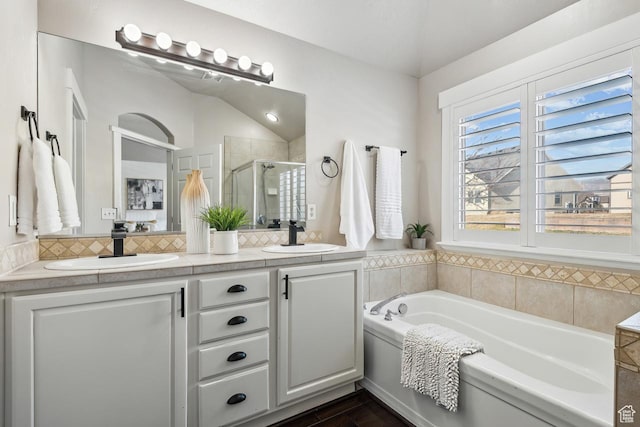 6228 W Apollo Way, Highland, UT 84003 - bathroom with plus walk in shower, lofted ceiling, backsplash, and vanity