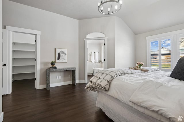 6228 W Apollo Way, Highland, UT 84003 - bedroom with ensuite bath, a spacious closet, a closet, dark hardwood / wood-style flooring, and a chandelier