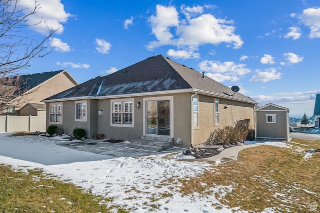6228 W Apollo Way, Highland, UT 84003 - snow covered rear of property with a shed