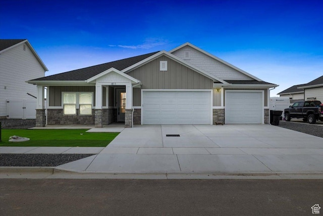 craftsman inspired home with a garage