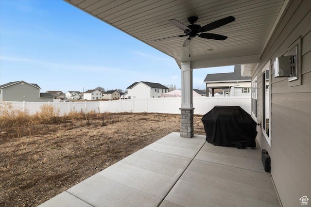 view of patio / terrace featuring ceiling fan and grilling area