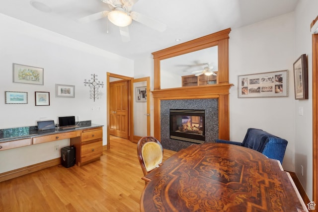 1 Spyglass Ct, Park City, UT 84060 - office with ceiling fan, a multi sided fireplace, and light hardwood / wood-style floors