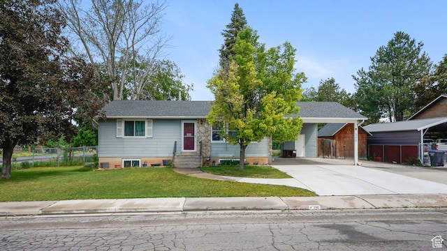 view of front of home featuring concrete driveway, entry steps, and an attached carport