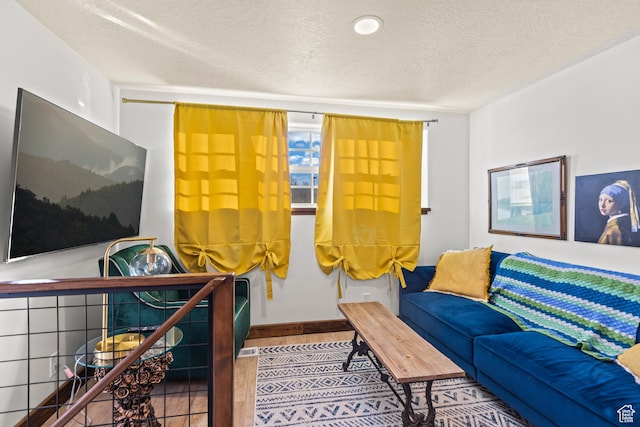 87 N 100 W, Marysvale, UT 84750 - tiled living room featuring a textured ceiling