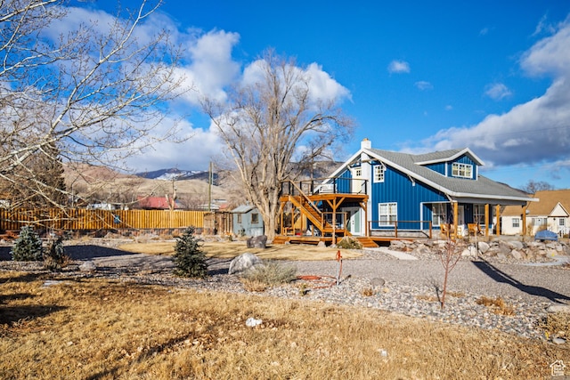 87 N 100 W, Marysvale, UT 84750 - rear view of house featuring a deck with mountain view and a shed
