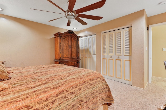 1450 E Gordon Ave N, Layton, UT 84040 - bedroom with ceiling fan, two closets, and carpet flooring