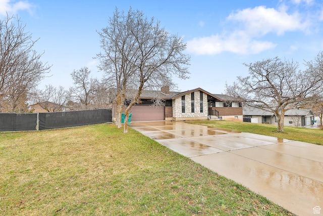 1450 E Gordon Ave N, Layton, UT 84040 - view of yard featuring a garage