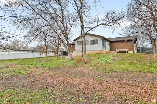 1450 E Gordon Ave N, Layton, UT 84040 - back of house featuring a lawn