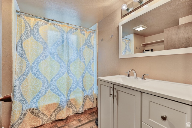 1450 E Gordon Ave N, Layton, UT 84040 - bathroom with vanity and a textured ceiling