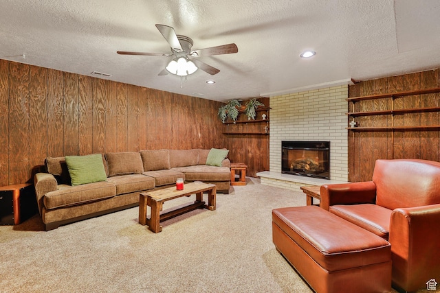1450 E Gordon Ave N, Layton, UT 84040 - carpeted living room with a brick fireplace, a textured ceiling, ceiling fan, and wooden walls