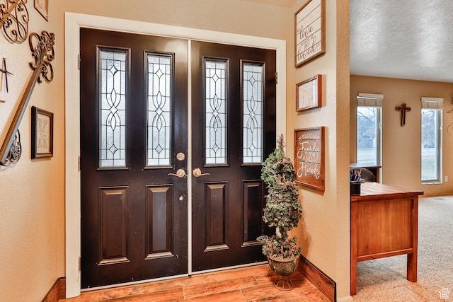 1450 E Gordon Ave N, Layton, UT 84040 - entryway with a textured ceiling and light wood-type flooring