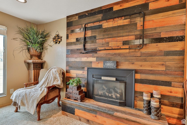 1450 E Gordon Ave N, Layton, UT 84040 - sitting room featuring a fireplace, wood walls, and carpet flooring