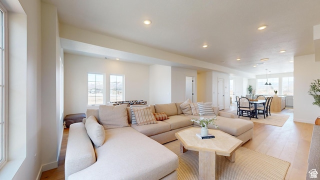 living room with light hardwood / wood-style flooring