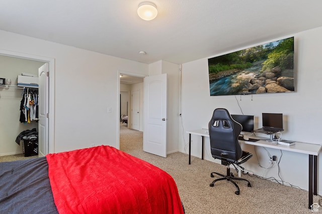 bedroom with carpet flooring and baseboards