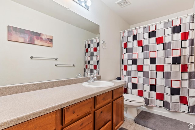 full bath with toilet, visible vents, shower / bath combination with curtain, and vanity