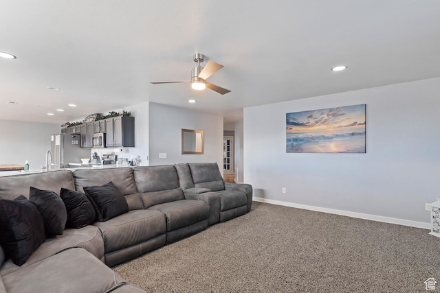 living room featuring ceiling fan, carpet flooring, and recessed lighting