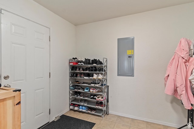 interior space featuring light tile patterned floors and electric panel