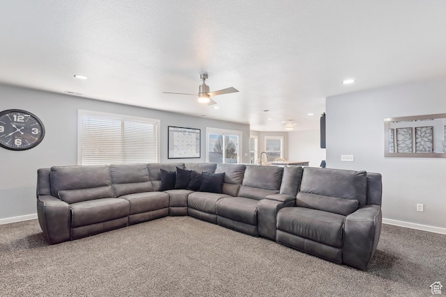 carpeted living room featuring recessed lighting, baseboards, visible vents, and ceiling fan