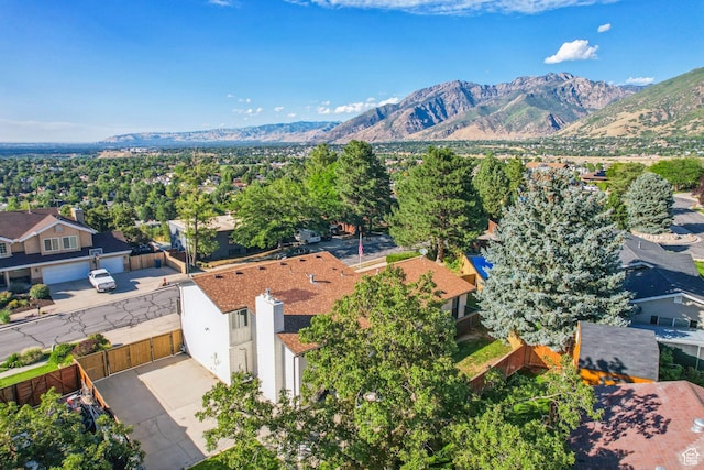 drone / aerial view featuring a mountain view and a residential view