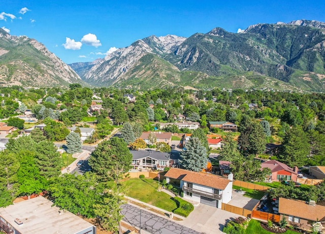 birds eye view of property featuring a mountain view