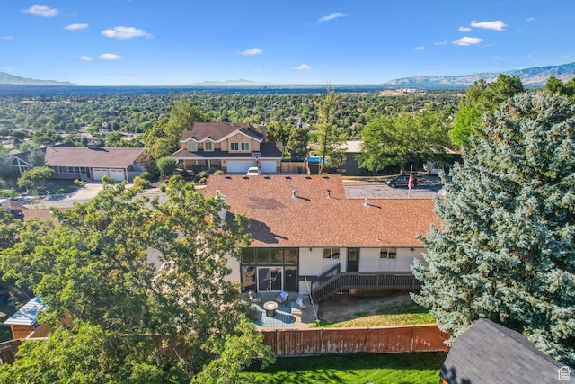 drone / aerial view featuring a mountain view