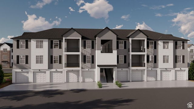 4836 S 710 W Unit M204, Mapleton, UT 84664 - multi unit property featuring an attached garage, stucco siding, and stairs