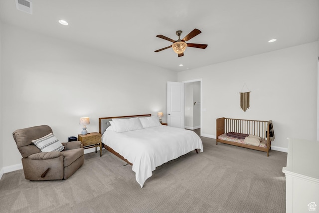 carpeted bedroom featuring ceiling fan